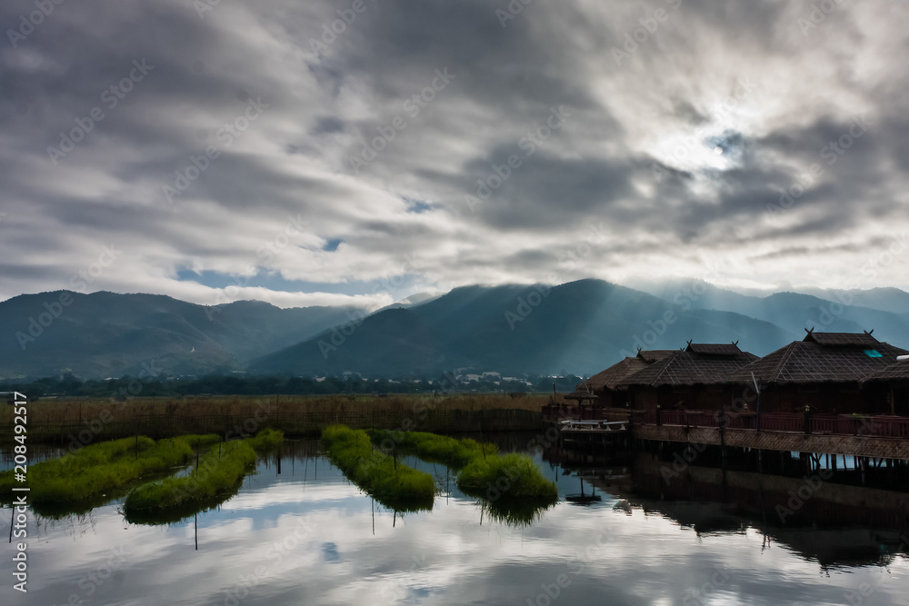 The Inle Lake and floating gardens under the sun rays