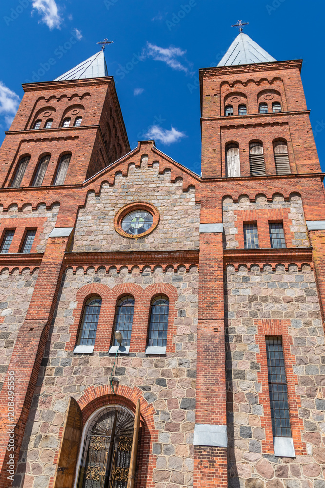 Majestic Church of God's Body from stone and brick in Ikazn, Belarus