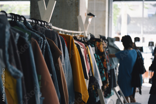 Women clothing on hangers in a boutique store