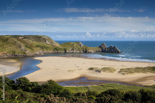 Three Cliffs Bay on the Gower Peninsular, West Glamorgan, Wales, UK, which is a popular Welsh coastline attraction of outstanding beauty