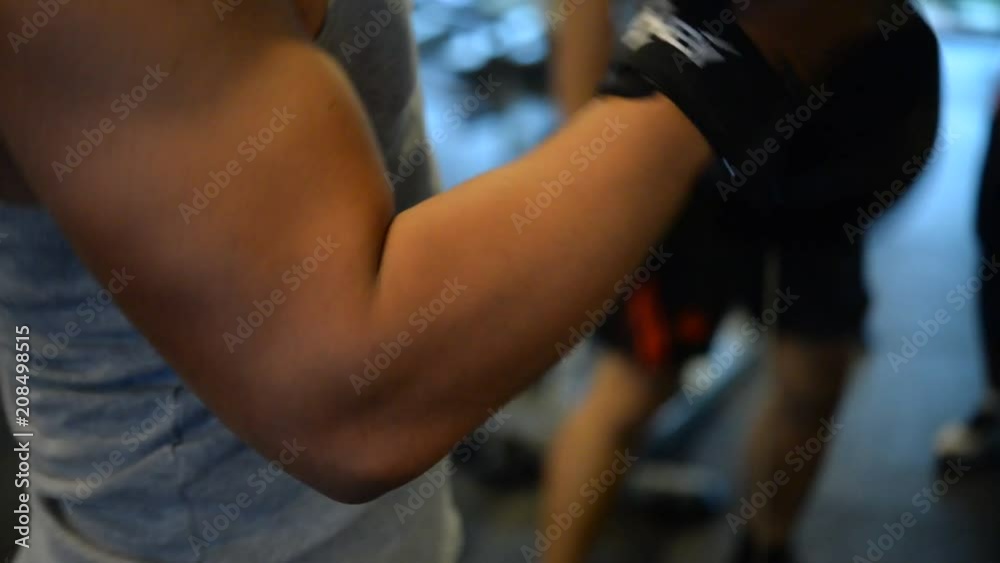Asian handsome man play fitness in the gym,A muscular young man workout,Thailand people,Love heath concept Asian handsome man play fitness in the gym,A muscular young man workout,Thailand people,Love heath concept