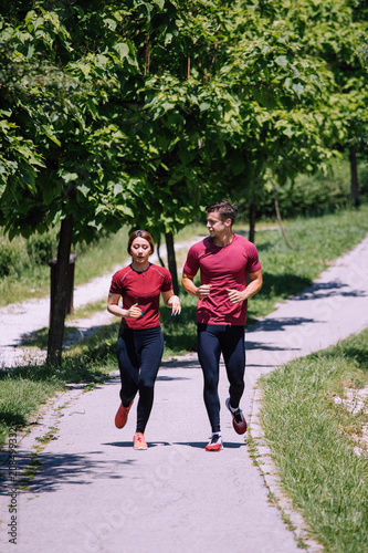 Young fitness couple outdoor exercise