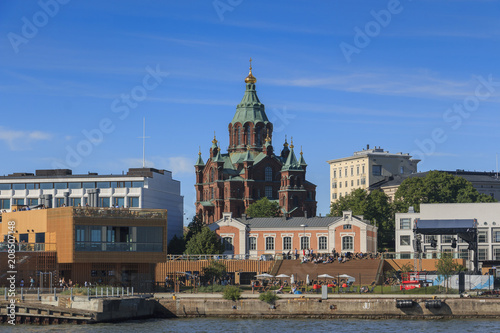Uspenski cathedral is bathed in the sun in the summer evening in Helsinki