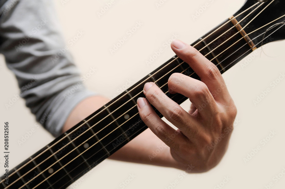 Fototapeta premium Guitar chords,Selective focus,Guitarist,The musicians are catching the guitar chords is F sharp chord full bar on white background