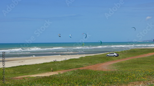 Kitesurfing practice at Aquiraz Beach, Ceará photo