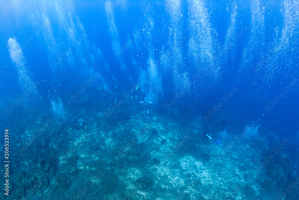 Bubbles from SCUBA divers on a heaily overcrowded dive site in Thailand Bubbles from SCUBA divers on a heaily overcrowded dive site in Thailand