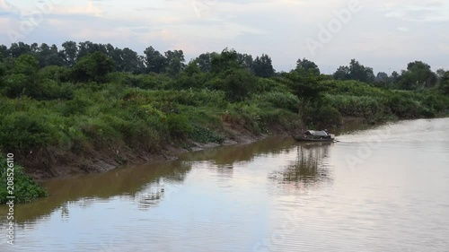 person sailing simple boat