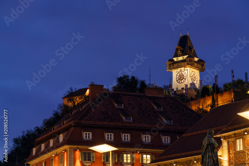 The Schlossberg or Castle Hill with the tower Uhrturm at night, Graz, Austria