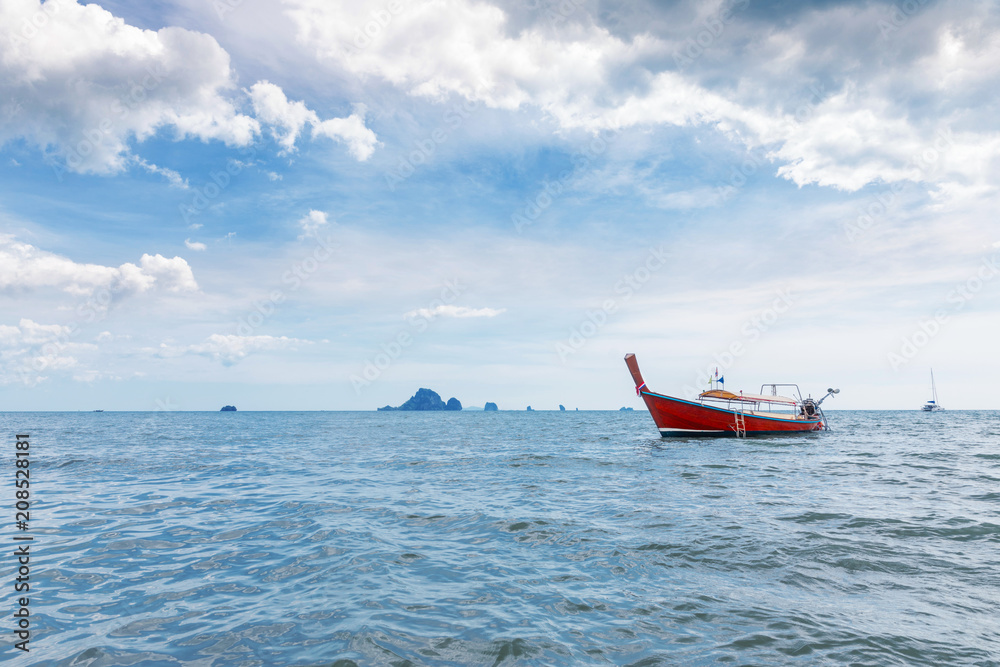 Amzing landscape with traditional longtail boats, tropical sea