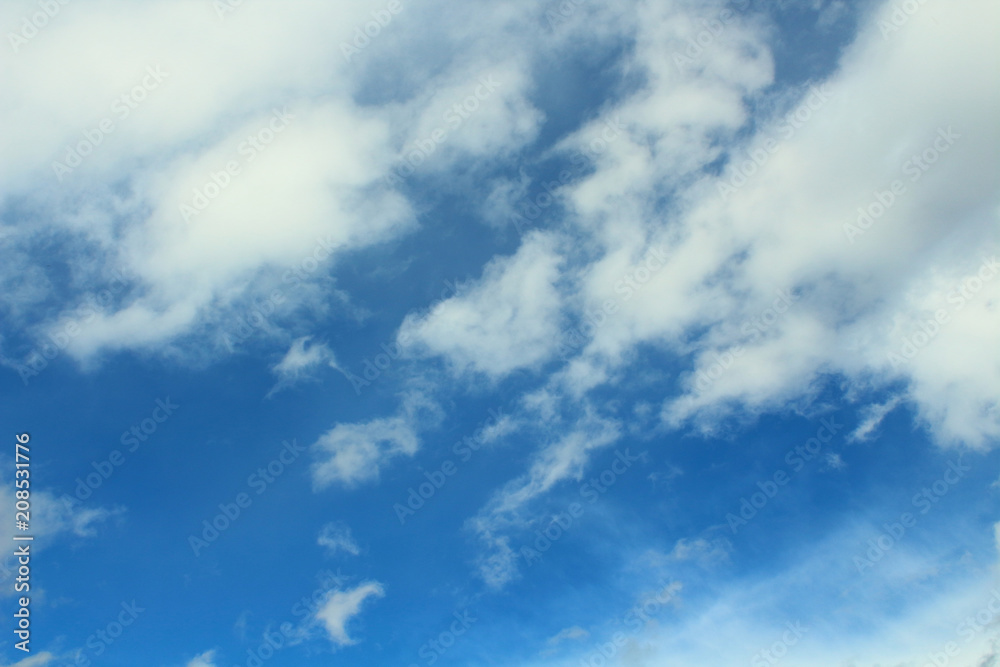 Beautiful blue sky and white cumulus clouds. Background. Landscape.