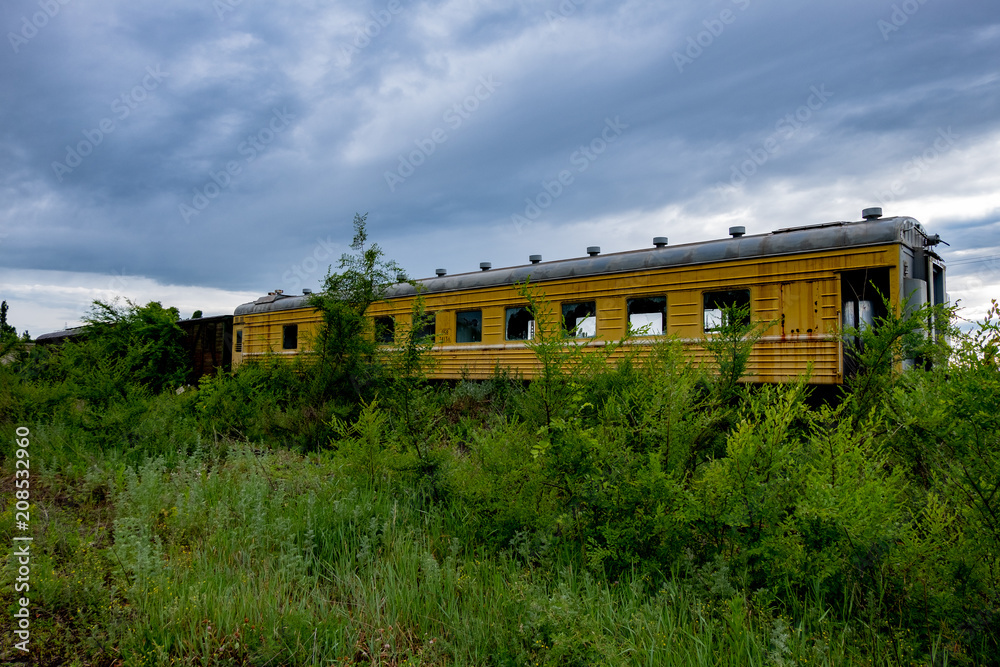 Abandoned train. Forgotten overgrown railway. Old rusty railway carriage Abandoned train. Forgotten overgrown railway. Old rusty railway carriage