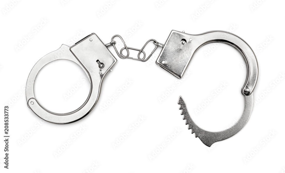 Opened handcuffs on white background. Top view. Opened handcuffs on white background. Top view.