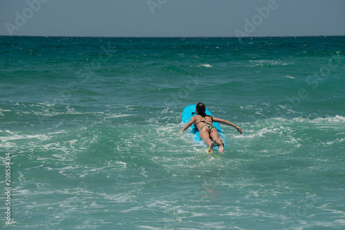 Young surfer girl