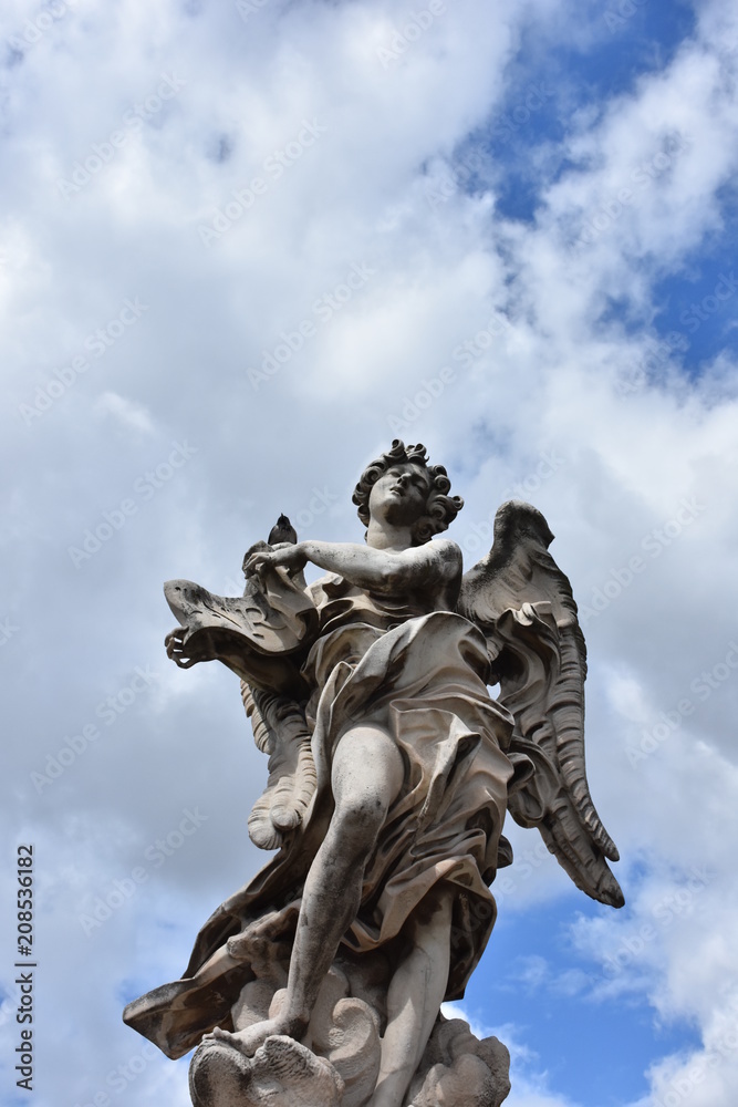 Rome, statues of the angels sculpted by pupils of Bernini in 1669 and placed on the S. Angelo bridge. Details and close-up Rome, statues of the angels sculpted by pupils of Bernini in 1669 and placed on the S. Angelo bridge. Details and close-up