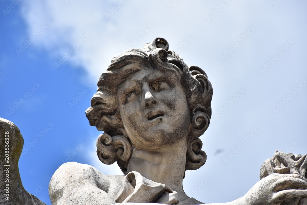 Rome, statues of the angels sculpted by pupils of Bernini in 1669 and placed on the S. Angelo bridge. Details and close-up Rome, statues of the angels sculpted by pupils of Bernini in 1669 and placed on the S. Angelo bridge. Details and close-up