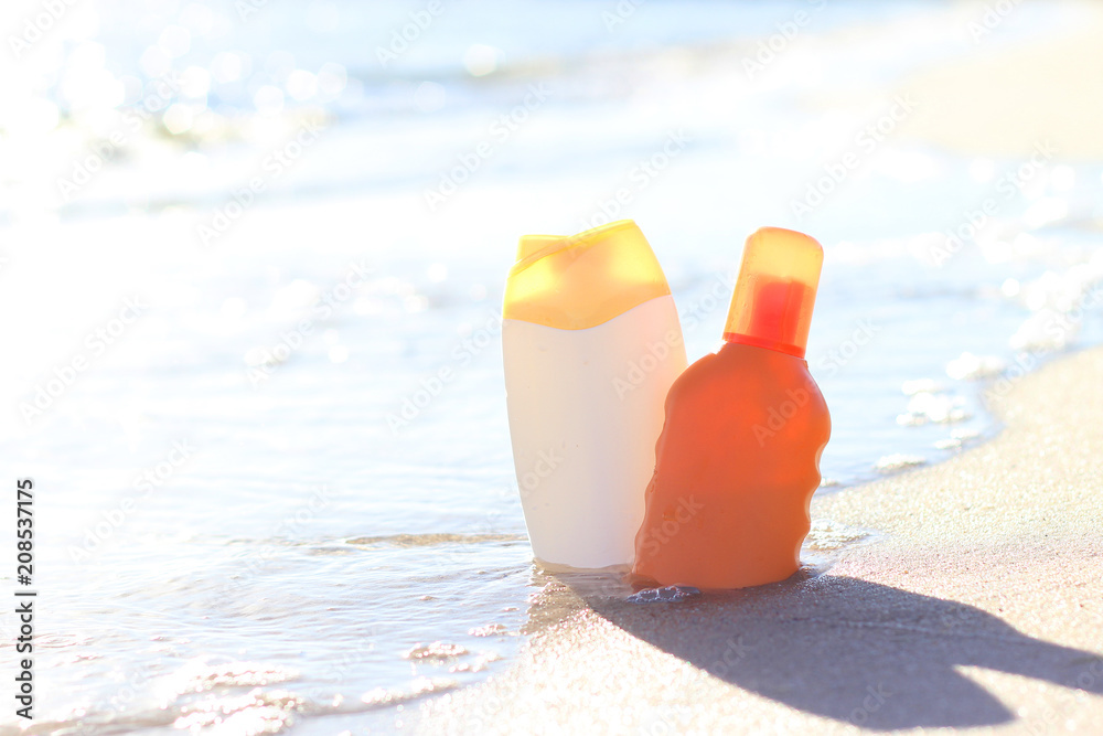 sunscreen on the seashore by the water sunscreen on the seashore by the water
