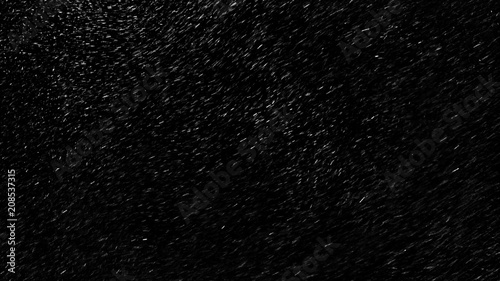 Falling down real snowflakes from left to right, fast snow, shot on black background, matte, wide angle, isolated, perfect for digital composition, post-production