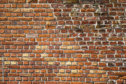 Old horizontal red brick wall