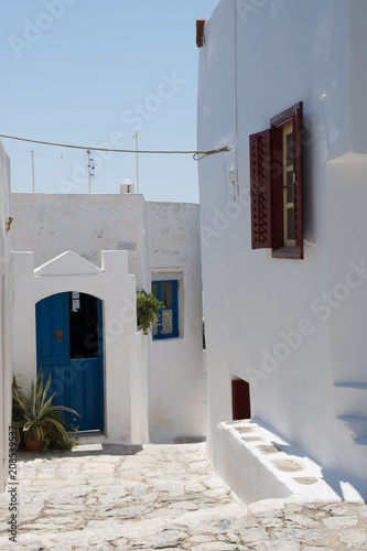 Fototapeta Naklejka Na Ścianę i Meble -  A small wooden in the narrow streets of Amorgos