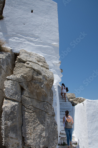 Amorgos,Greece-August 4 ,2017.The  air makes it difficult to reach the top of the castle through this narrow staircase