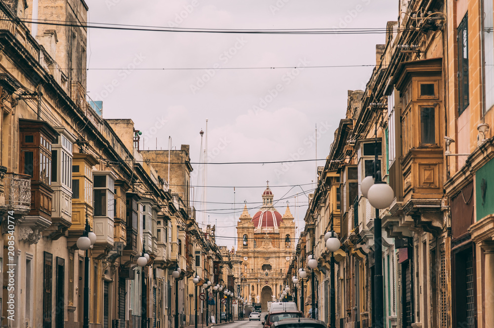 Stree view in Zabbar, Zabbar Parish Church