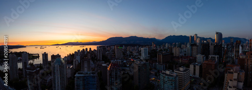 Vancouver, British Columbia, Canada - May 11, 2018: Aerial Panorama of the beautiful modern city during the night after sunset.