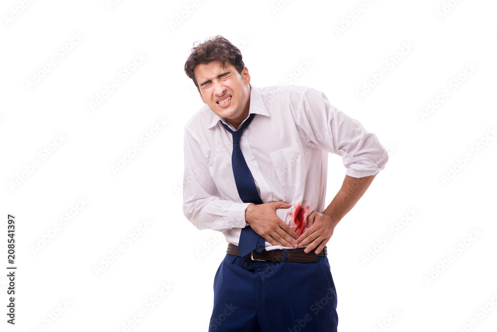 Wounded businessman with blood stains isolated on white backgrou