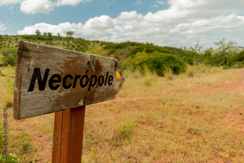 Necropole signpost in the Silves region of the Algarve, Portugal. The fingerpost points the way to Neolithic burial sites found along a walking route in the countryside near Gregorios. photo