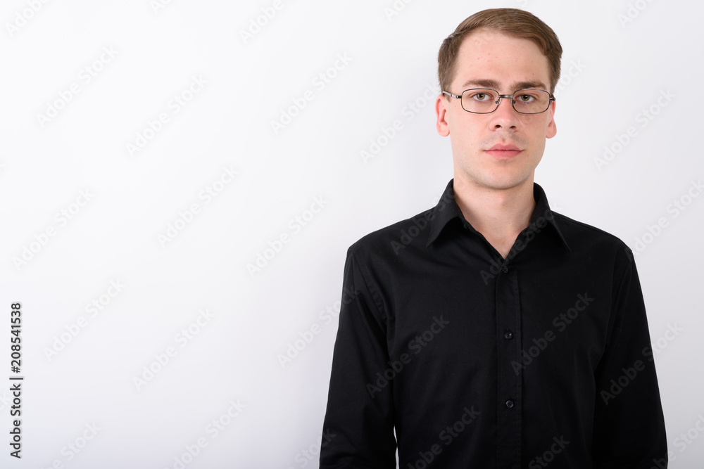 Young handsome businessman against white background Young handsome businessman against white background