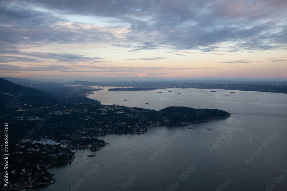 Aerial view of the Horseshoe Bay during a vibrant sunset. Taken in Vancouver, British Columbia, Canada.