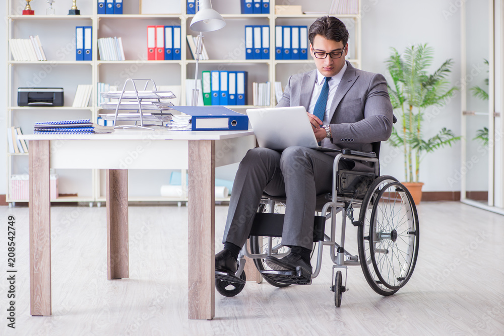 Disabled businessman working in the office Disabled businessman working in the office