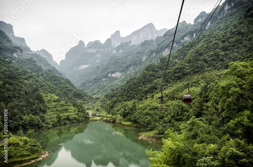 The longest cableway in the world, landscape view with the lake, mountains, green forest and mist - Tianmen Mountain, The Heaven's Gate at Zhangjiagie, Hunan Province, China, Asia photo