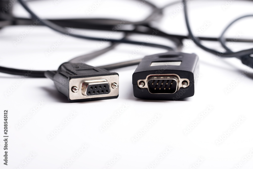 Adapter for a computer with a black wire on a white background Adapter for a computer with a black wire on a white background