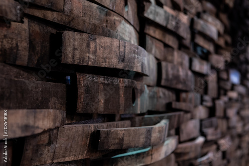 Narrow Focus of Bourbon Barrels on Wall