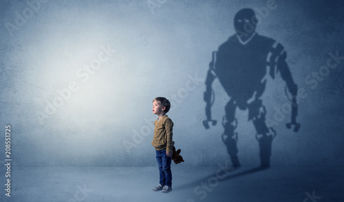Little boy s self image appear as a big robotman shadow on his background   © ra2 studio