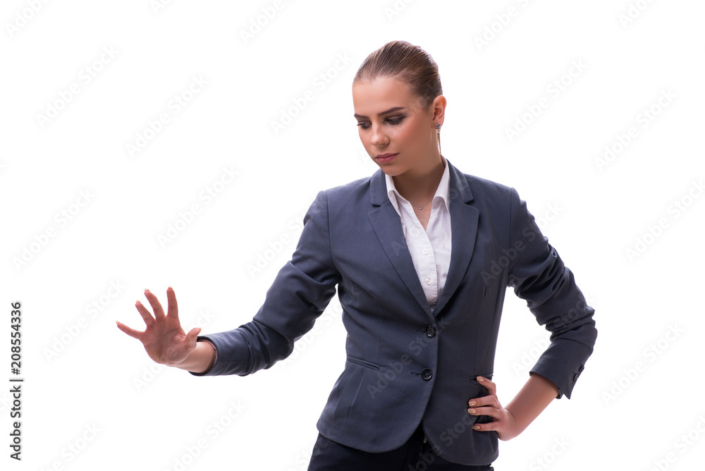 Young businesswoman pressing virtual button on white Young businesswoman pressing virtual button on white