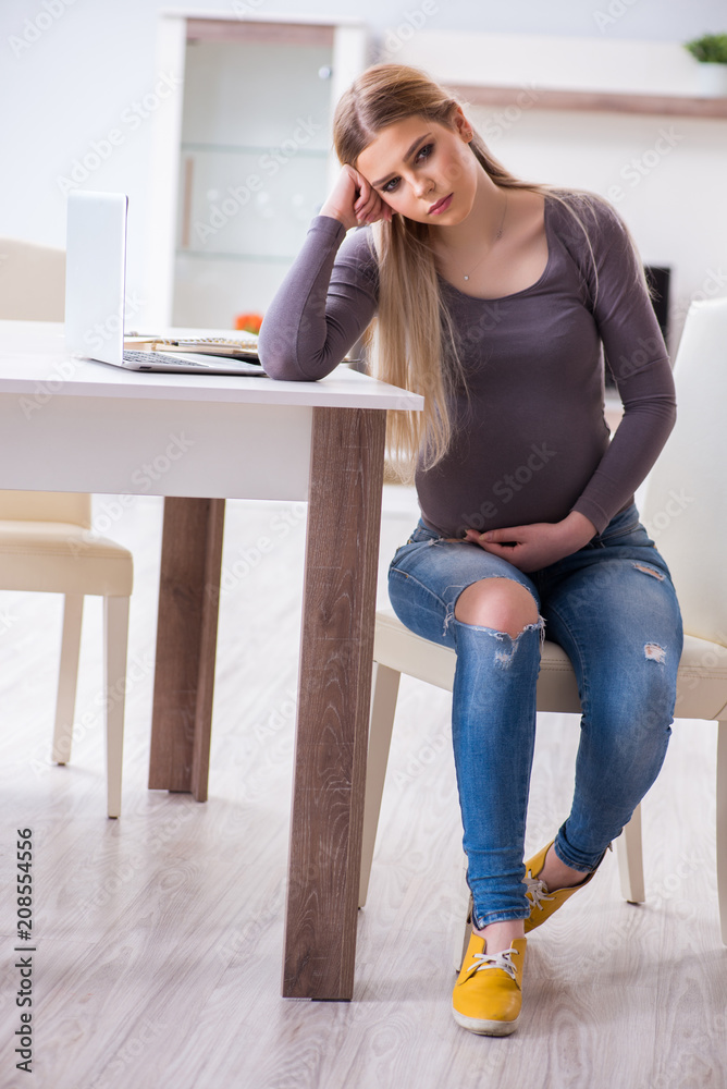 Pregnant woman at home getting ready for childbirth Pregnant woman at home getting ready for childbirth