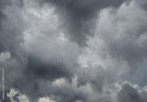 Gray cloud hunk formations on tropical sky , Nimbus moving , Abstract background from natural phenomenon 