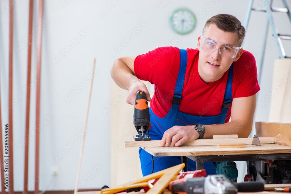 Contractor working in the workshop Contractor working in the workshop