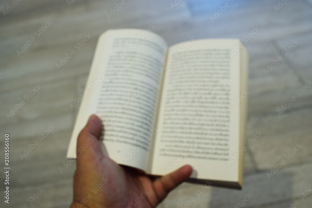 Blur picture of the book unfolded in human hand , Reading activity is being neglected and forgotten , The sight of people with degenerative eye health
Blur picture of the book unfolded in human hand , Reading activity is being neglected and forgotten , The sight of people with degenerative eye health
