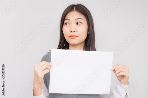 Beautiful young asian women holding blank white paper banner