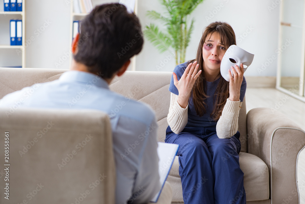 Woman suffering from home violence visiting doctor Woman suffering from home violence visiting doctor