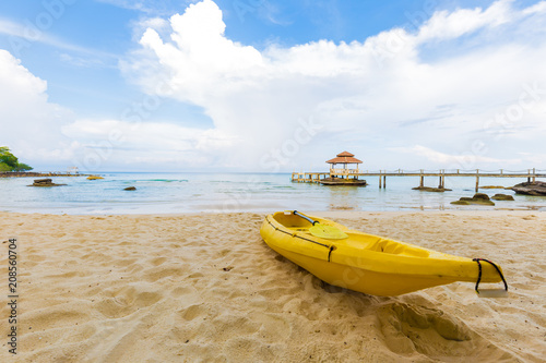 Photography Nice tropical white sand beach with kayak boat in island