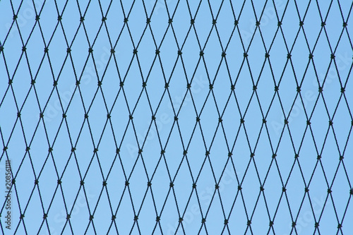 Pattern of seamless mesh nylon on blue sky background