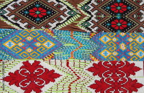 The texture of the ornaments from the multi-colored beads. National Ukrainian ornaments