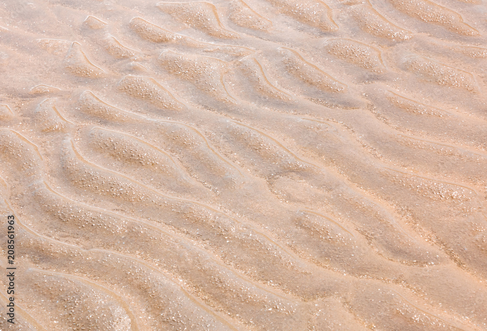 Wave on fine sand when the sea is ebb tide Wave on fine sand when the sea is ebb tide