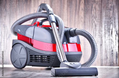 Canister vacuum cleaner for home use on the floor