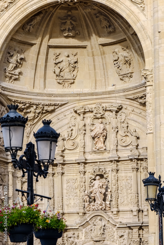 Logroño, La Rioja, Spain. April 23, 2018: Detail of the sculptures of the upper arch of the main door of the concathedral of Santa Maria the round Gothic style and built in the fifteenth century