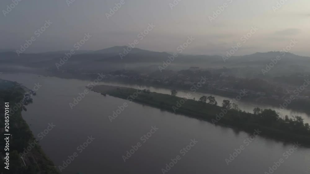 Aerial view of Mekong river between Chiang Khong, a small town in Chiang Rai Province, Northern Thailand and Houay Xai, the capital of the Laos province of Bokeo Aerial view of Mekong river between Chiang Khong, a small town in Chiang Rai Province, Northern Thailand and Houay Xai, the capital of the Laos province of Bokeo