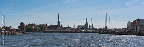 Panorama image of Hanseatic city of Luebeck with trave river, Luebeck, Germany